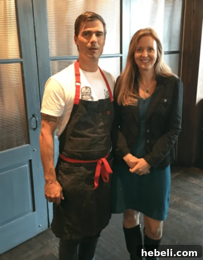 The author posing with celebrity Chef Hugh Acheson at the Atlanta event.
