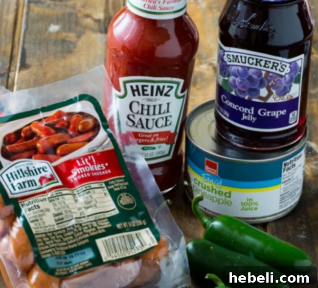 A close-up of savory Crock Pot Little Smokies simmering in their rich, flavorful sauce.