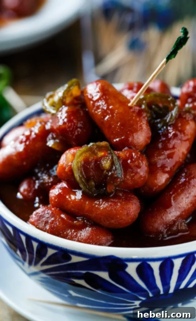 Serving Crock Pot Little Smokies at a party, showing their appealing glaze and easy-to-grab nature.