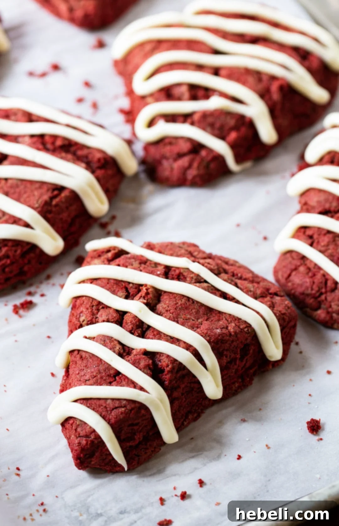 Red Velvet Scone drizzled with cream cheese glaze.