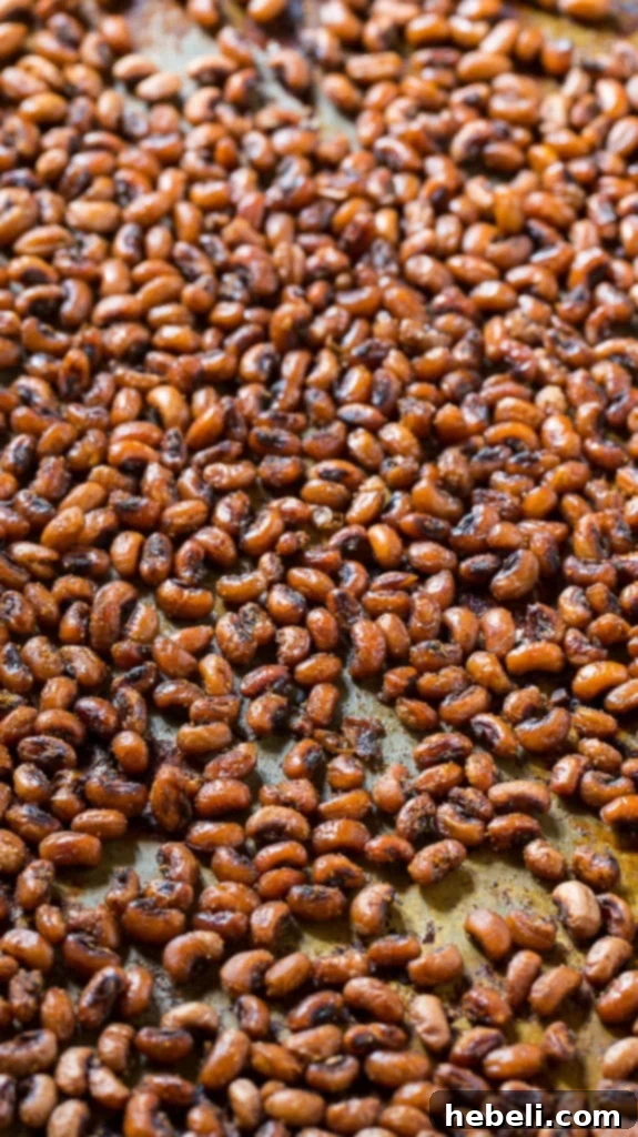 Crispy Roasted Black-Eyed Peas 3 A serving of crispy and spicy roasted black-eyed peas in a small white bowl.