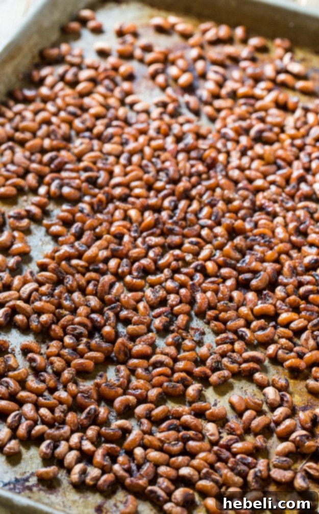 Crispy Roasted Black-Eyed Peas 4 Roasted black-eyed peas seasoned with Cajun spice, ready for the oven.