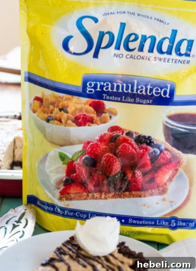 Airy Peanut Butter Delight 4 A slice of Lighter Peanut Butter Pie, showing its beautiful layers of chocolate crust and creamy, golden peanut butter filling, topped with a delicate chocolate drizzle.