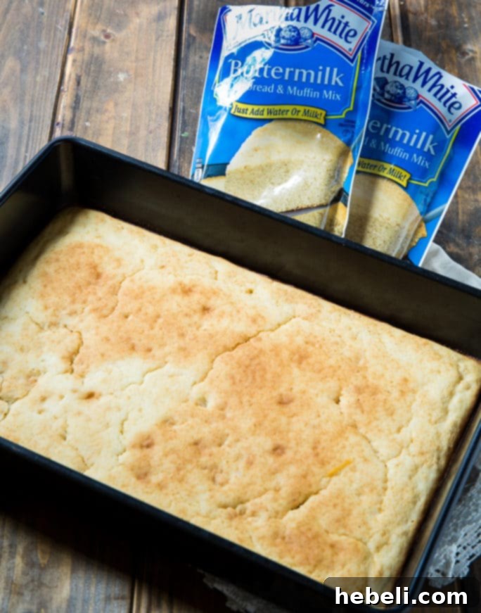 Ultimate Barbecue Ranch Cornbread Salad 3 Close-up of Barbecue-Ranch Cornbread Salad showing the distinct layers in a serving bowl.