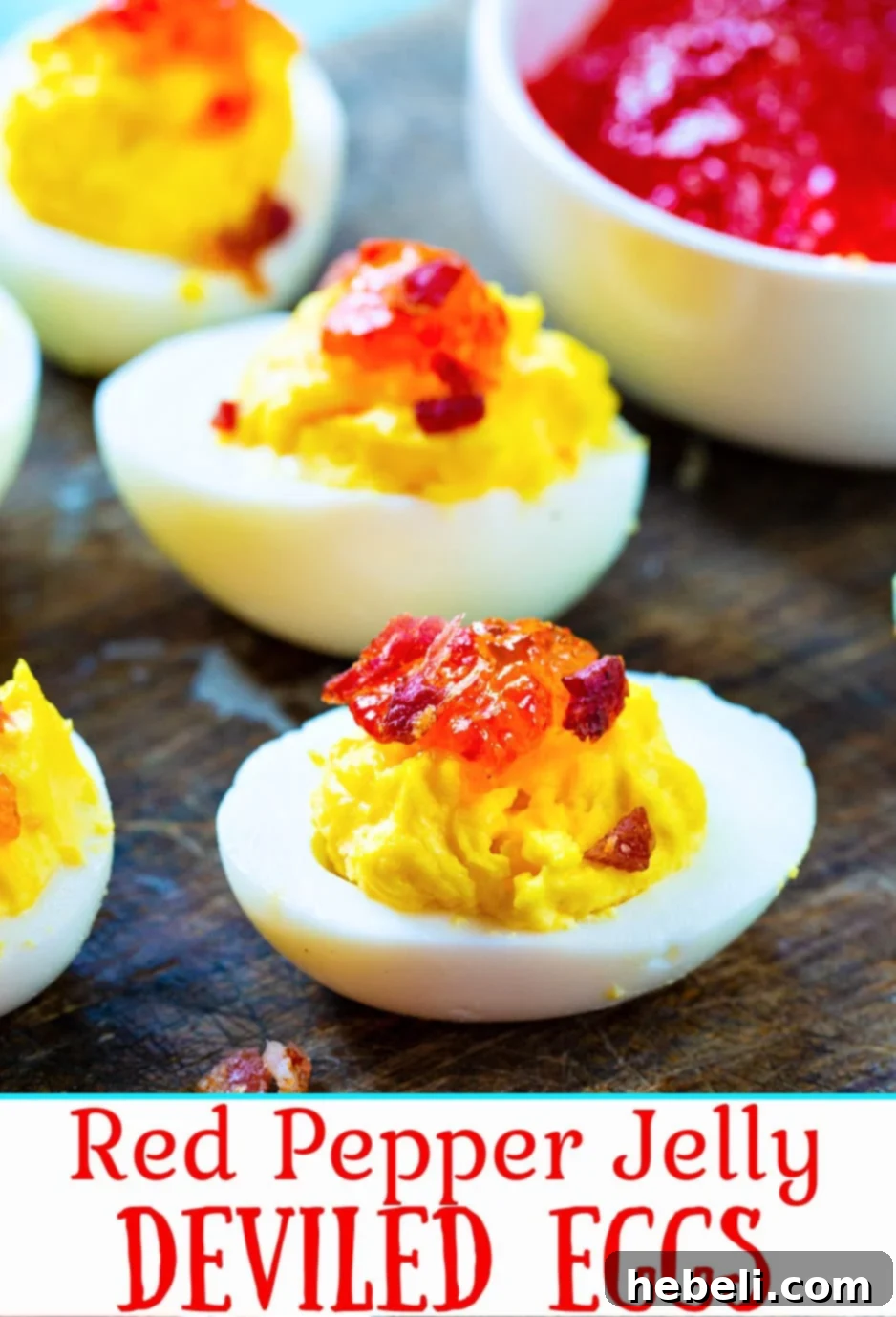 Smoky Bacon & Sweet Heat Deviled Eggs 6 A beautifully presented serving of Red Pepper Jelly Deviled Eggs with Bacon, ready for a special gathering.
