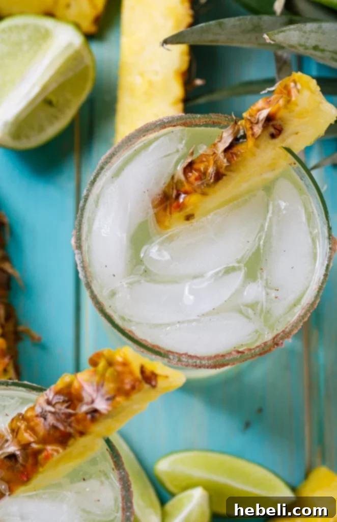 Ingredients for Pineapple-Cinnamon Margarita laid out on a table