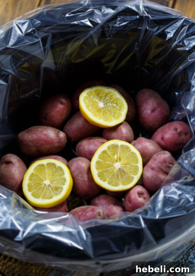 Crockpot Low Country Feast 4 A close-up of cooked Slow Cooker Low Country Boil in the pot, showing the vibrant shrimp, corn, and sausage.