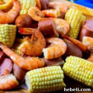 Crockpot Low Country Feast 6 Slow Cooker Low Country Boil spread out on a table, ready to be served.