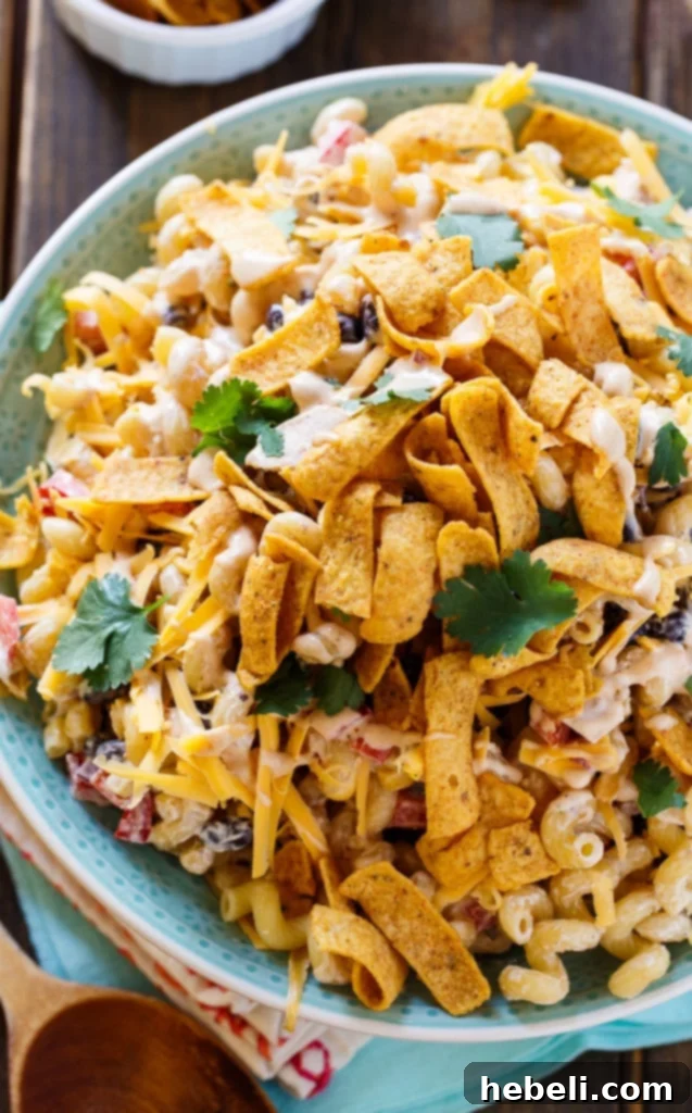 Zesty BBQ Ranch Pasta Toss 3 Close-up view of the BBQ Ranch Pasta Salad, showcasing its creamy dressing, colorful vegetables, and tender chicken pieces, ready to be enjoyed.