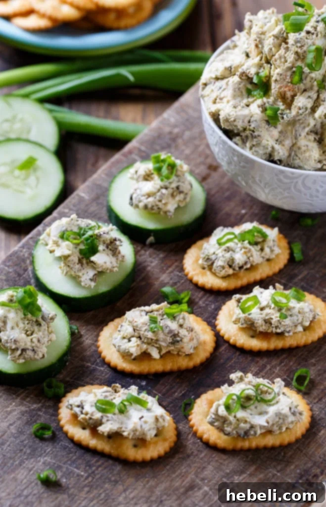 Smoked Oyster Spread being mixed in a bowl, showing the creamy texture.
