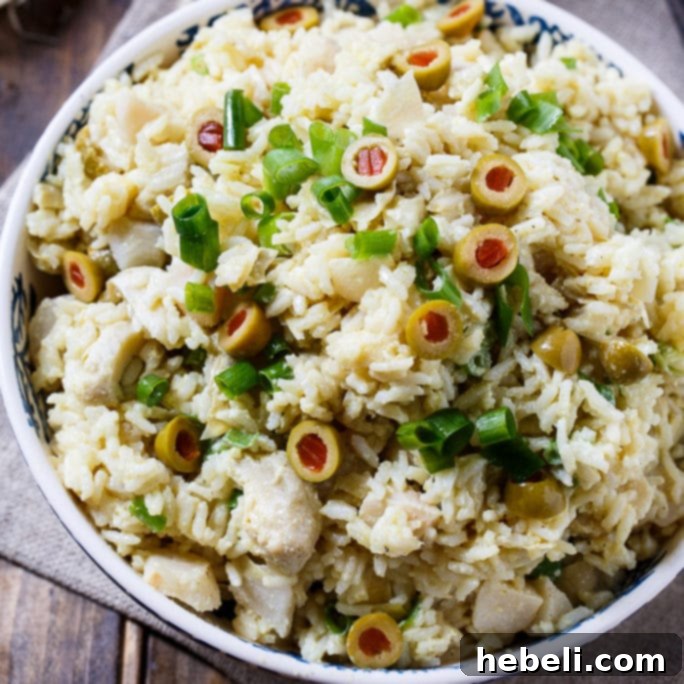 Mediterranean Artichoke Rice Salad 2 Artichoke-Rice Salad - a cool and creamy side dish flavored with curry powder, perfect for summer potlucks and picnics.