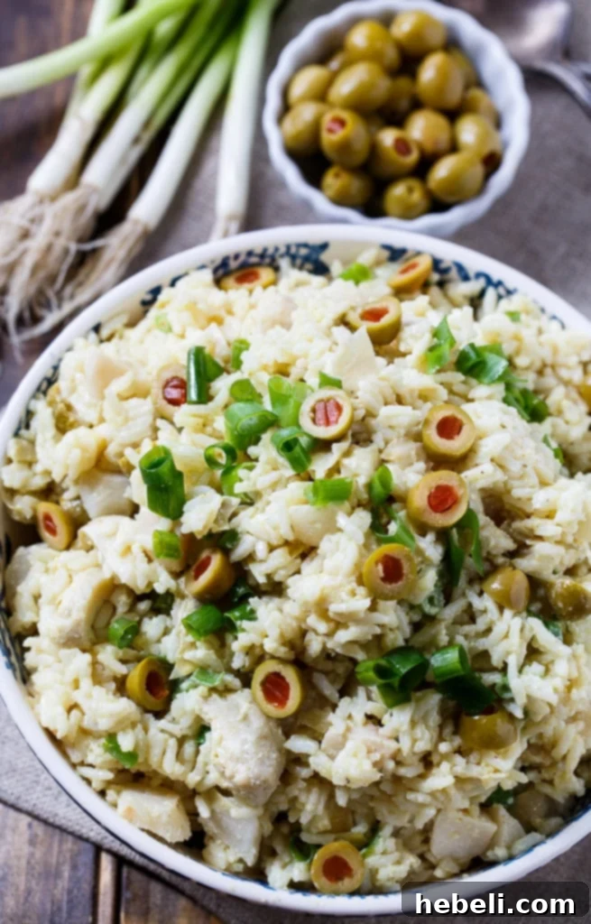 Mediterranean Artichoke Rice Salad 3 Chilled Artichoke-Rice Salad ready to serve, a creamy and flavorful side for any gathering.
