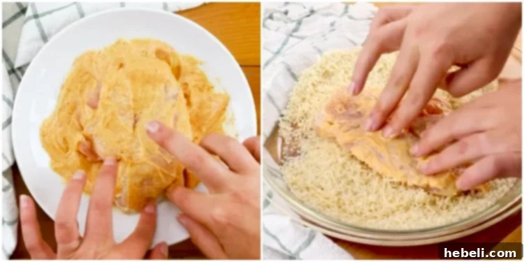 Process of coating chicken breast: first with mayonnaise, then pressing into Panko-Parmesan mixture