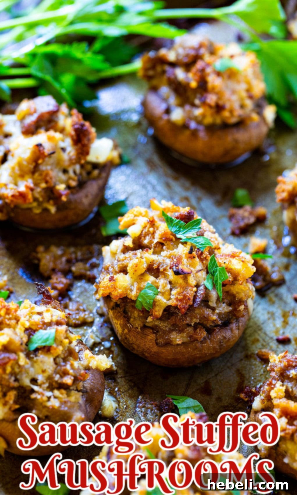 Beautifully prepared stuffed mushrooms ready to be baked on a baking sheet.
