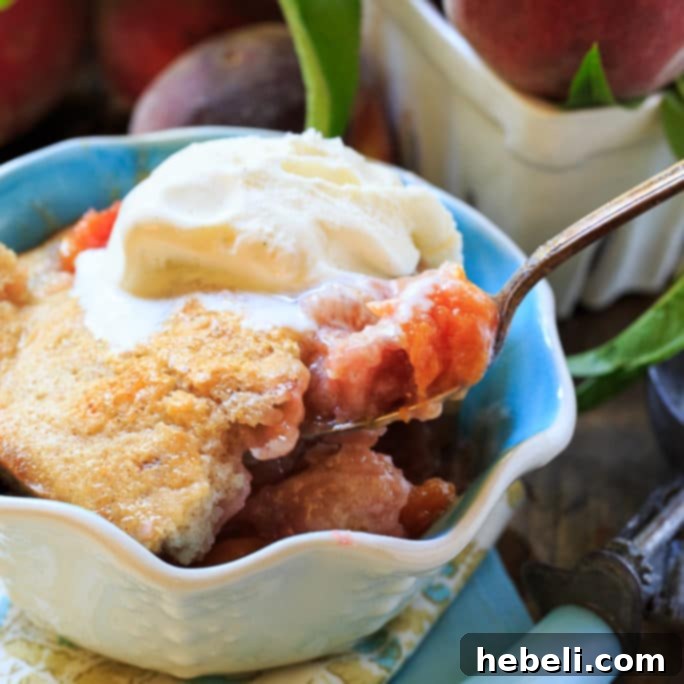 Easy Southern Peach Cobbler served warm with ice cream