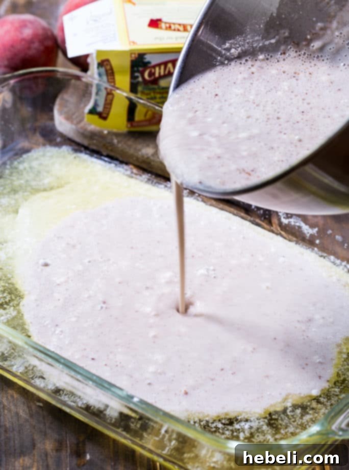 Melted Challenge Butter in a 9x13 inch pan, ready for peach cobbler batter