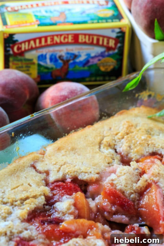 Close-up of baked Easy Southern Peach Cobbler crust, highlighting the rich, buttery texture