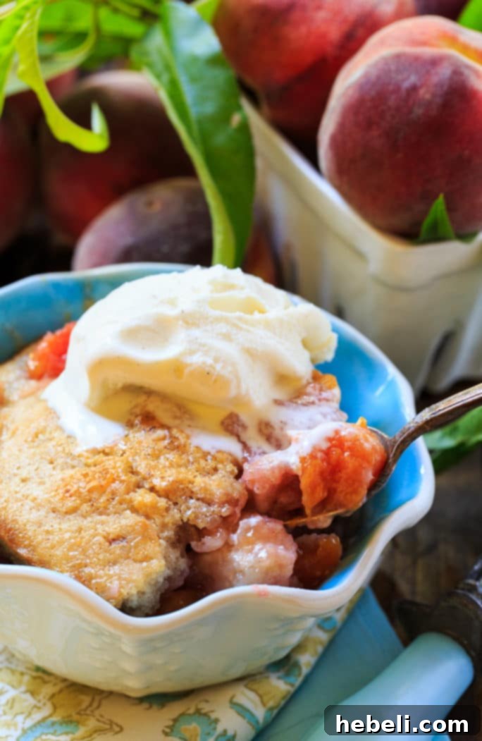 Another perspective of the freshly baked peach cobbler, ready to be served