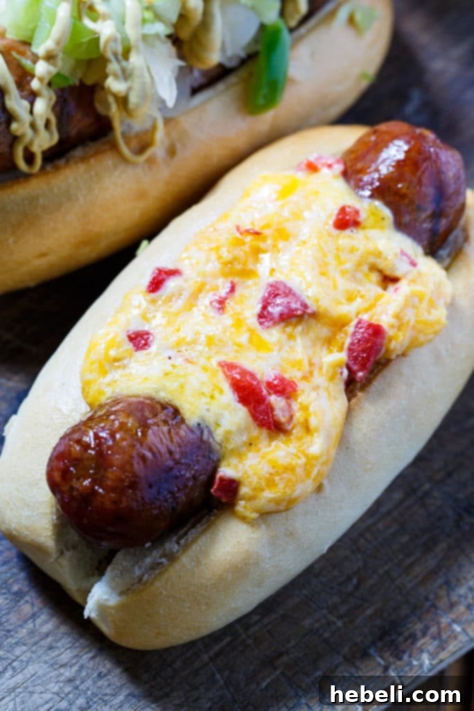 Grilled Brats topped with Pimento Cheese and Green Tomato Chow Chow