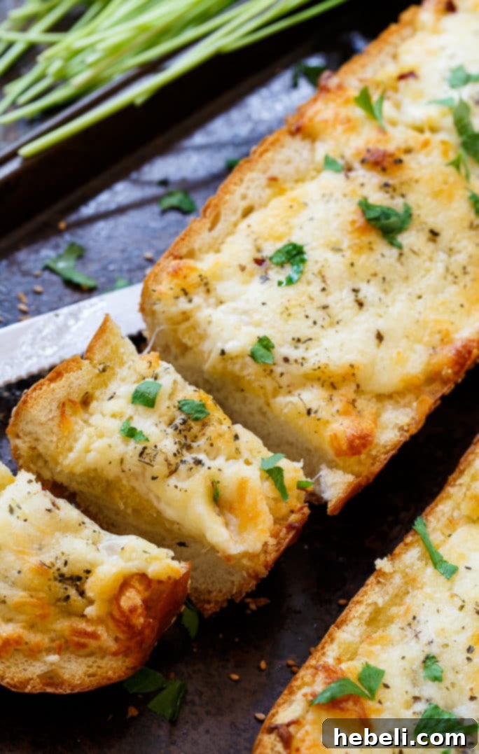 Ooey Gooey Garlic Bread 3 Close-up of garlic bread ingredients including butter, garlic, olive oil, and cheeses.