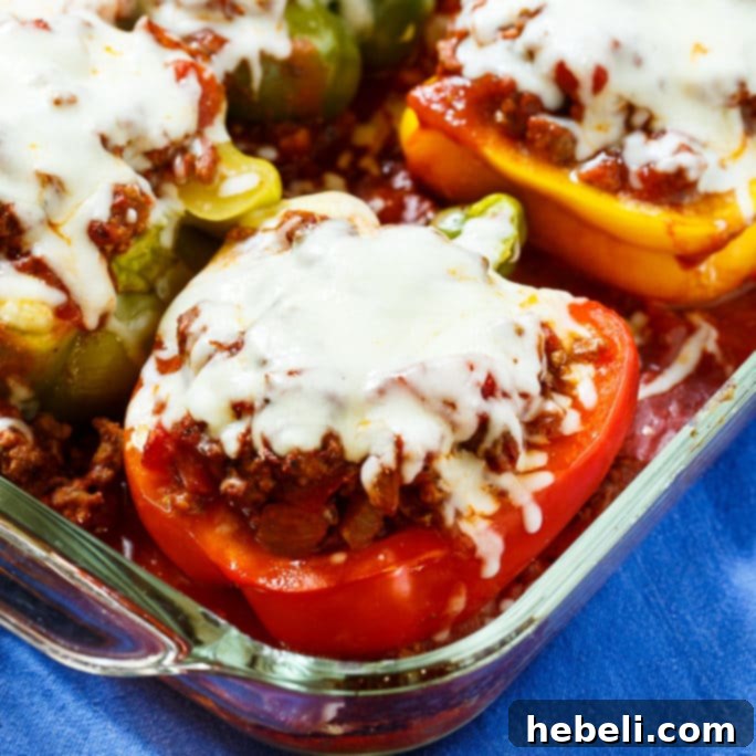 Lasagna Bell Pepper Bake 2 Lasagna Stuffed Peppers, a low carb twist on a classic lasagna recipe, filled with meat and cheese.