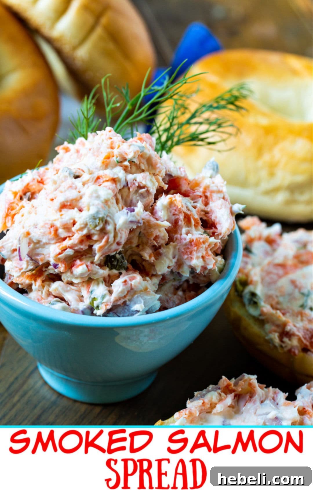 Smoked Salmon Mousse 5 A close-up shot of creamy Smoked Salmon Spread in a small blue bowl, garnished with fresh dill.