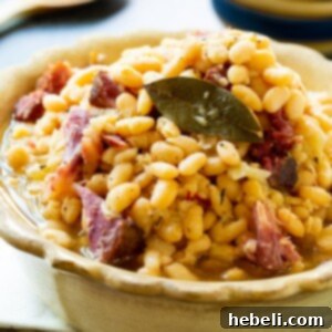 Slow Cooker White Beans with Ham Hocks in a bowl.