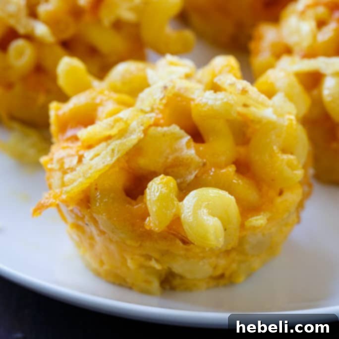 Delicious Mac and Cheese Muffins alongside Johnsonville Corn Dogs for a perfect family meal