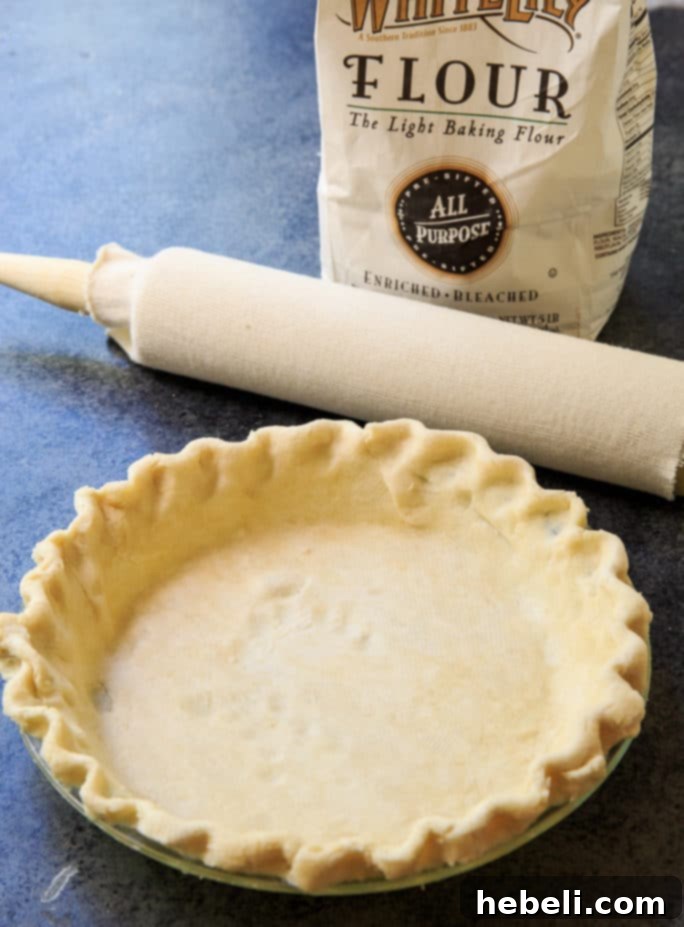 Finished Flaky Pie Crust in Pie Plate