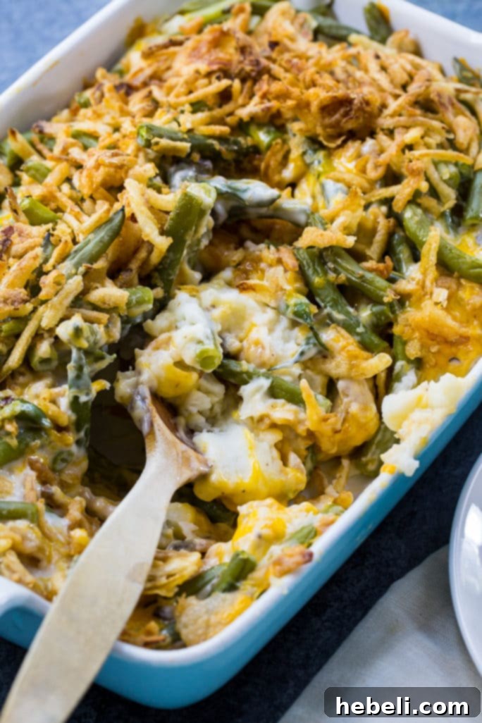 Creamy Mashed Potato Green Bean Bake 3 Close-up of Mashed Potato Green Bean Casserole, showcasing its rich layers and crispy topping.