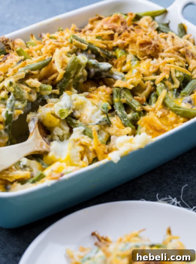 Creamy Mashed Potato Green Bean Bake 4 Overhead view of Mashed Potato Green Bean Casserole, highlighting its golden crust.