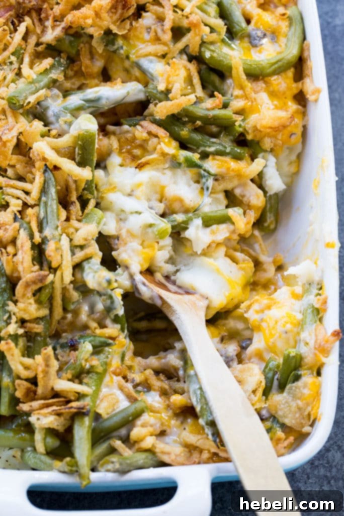 Creamy Mashed Potato Green Bean Bake 6 A freshly baked Mashed Potato Green Bean Casserole, steaming and ready to serve.