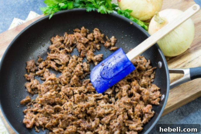 Johnsonville Italian Ground Sausage being prepared.