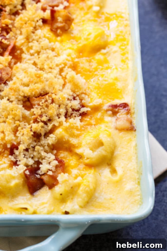 Decadent Crab Macaroni 4 Close up shot of creamy crab mac and cheese with a fork