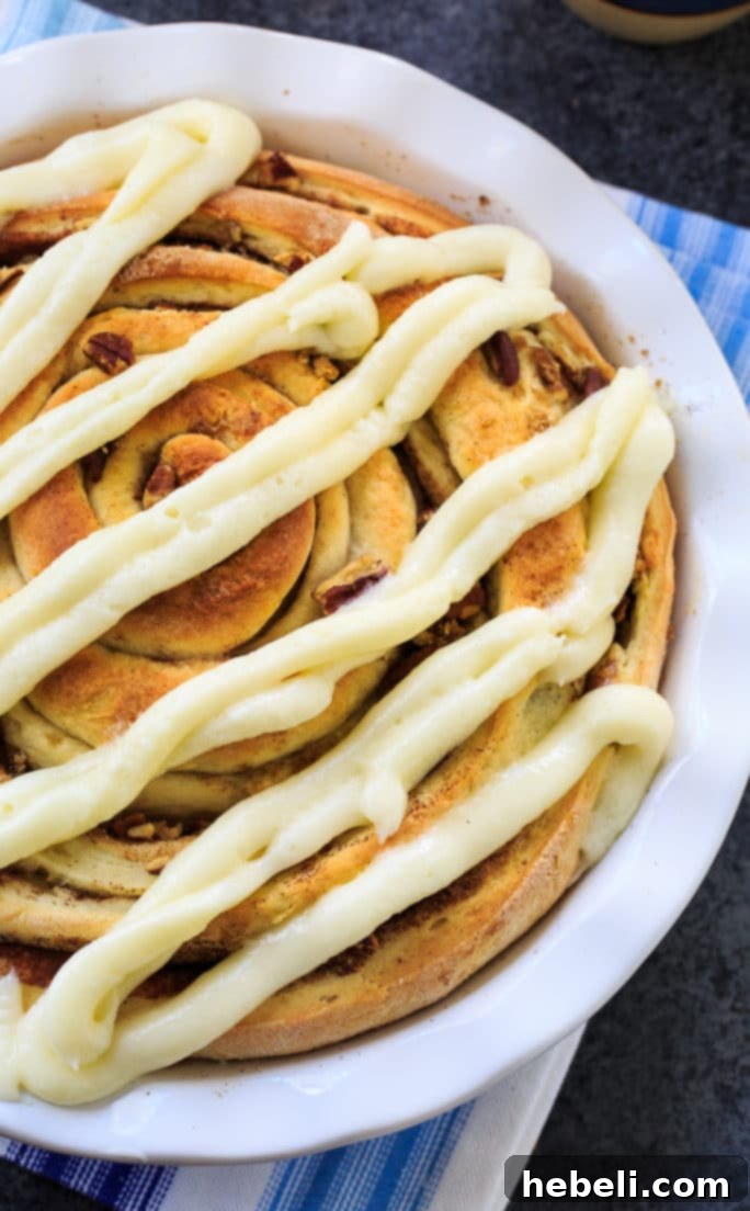 Giant Cinnamon Roll made in a pie pan for an extra gooey center