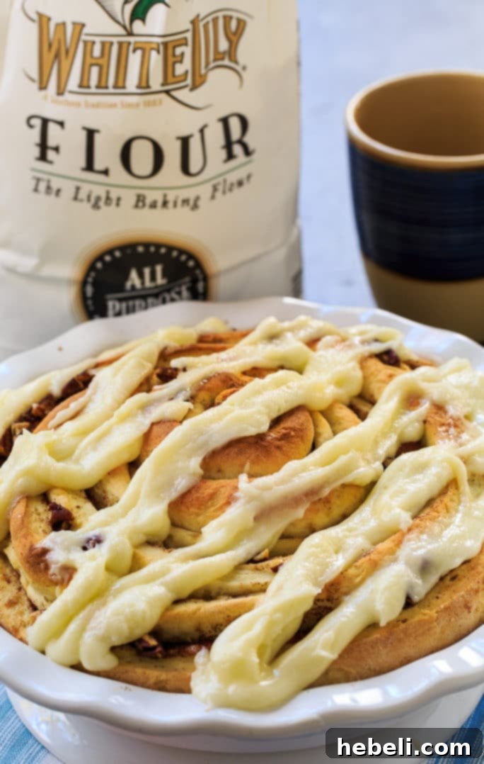Giant Cinnamon Roll dough wrapped in a spiral in a pie pan