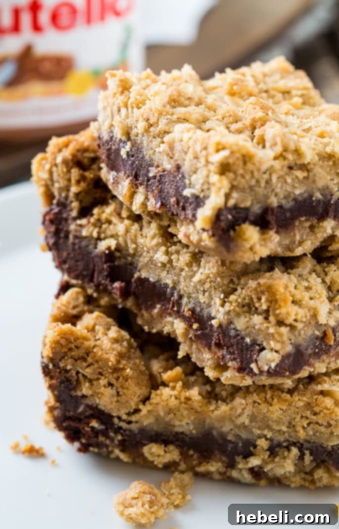 Stacked Nutella Fudge Bars on a plate