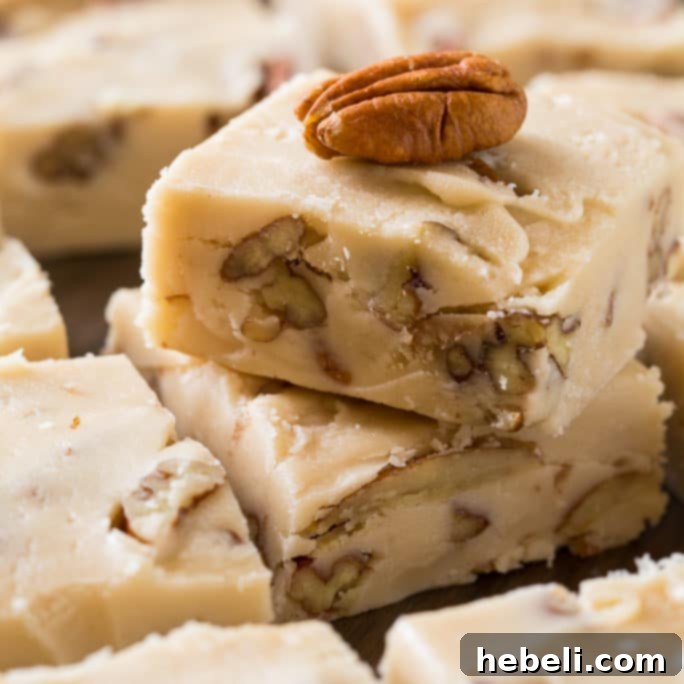 Rich and creamy Butter Pecan Fudge squares with toasted pecans