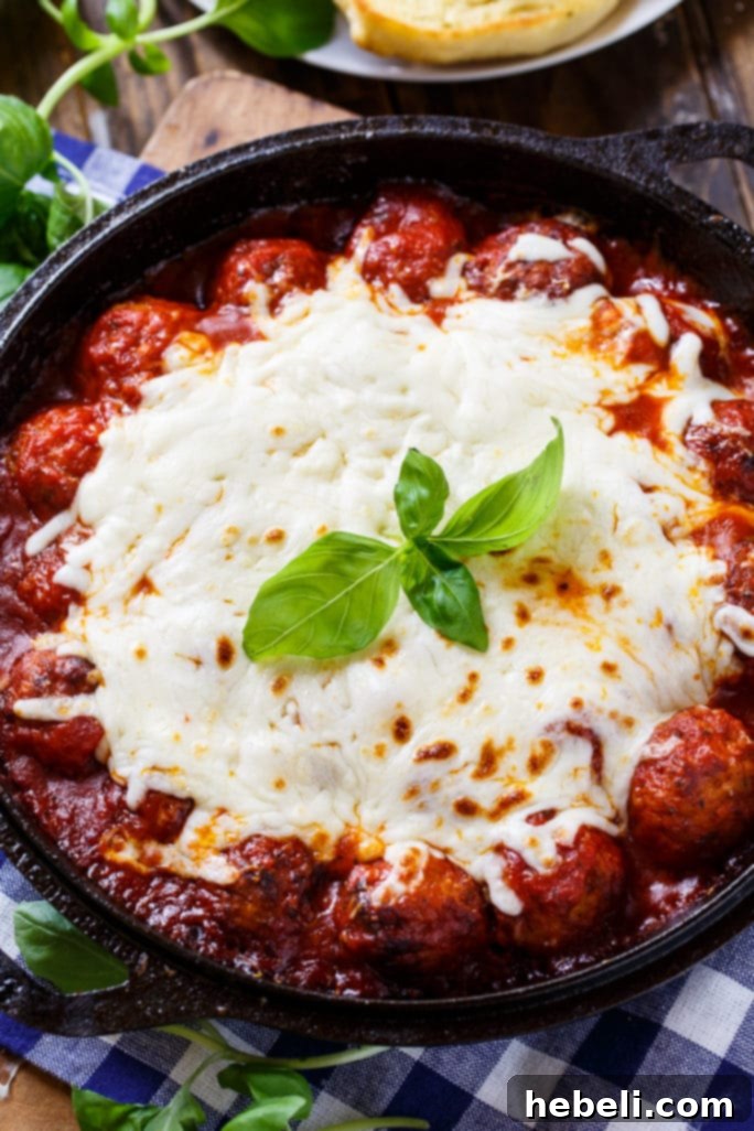 Cheesy Meatball Skillet offers an easy solution for both appetizers and main courses during busy times.