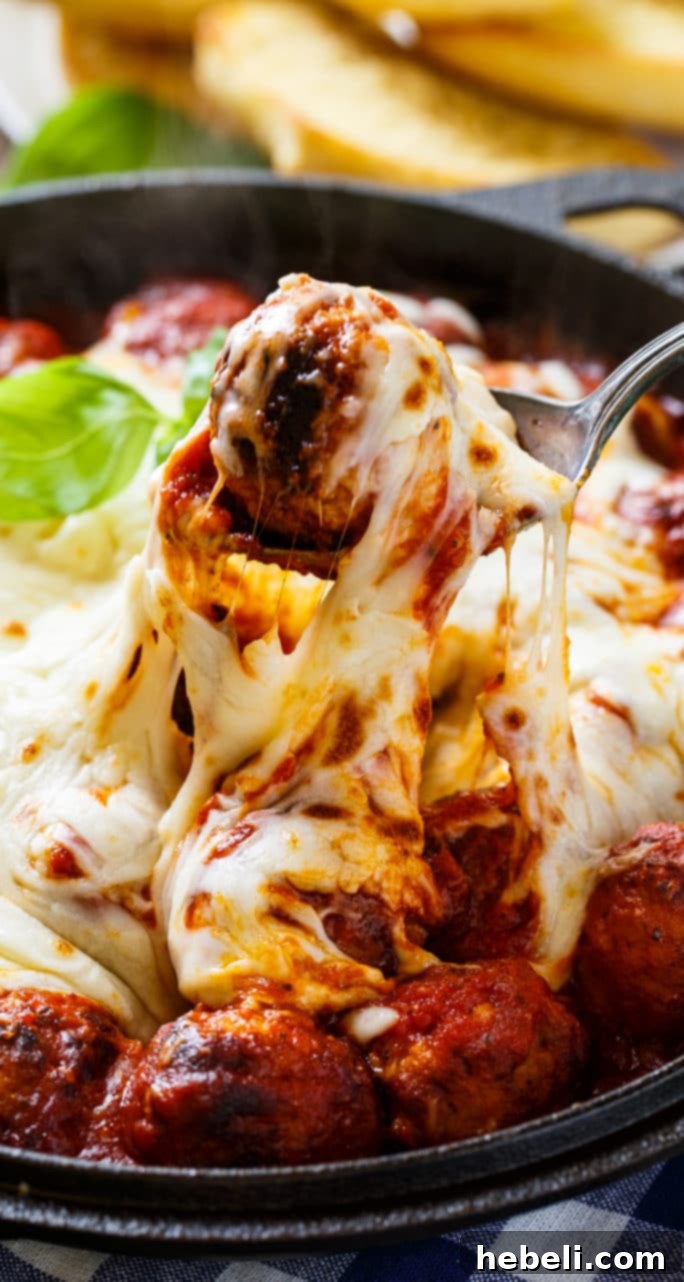 Cheesy Meatball Skillet with vibrant Marinara Sauce and perfectly melting cheese.