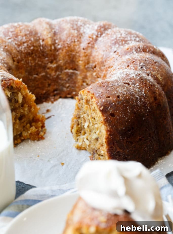 Another beautiful shot of Vanilla Wafer Cake with Coconut, highlighting its golden crust and inviting appearance.