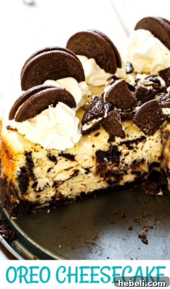 Cheesecake with Oreos topped with whipped cream and oreo cookies, a perfect dessert.