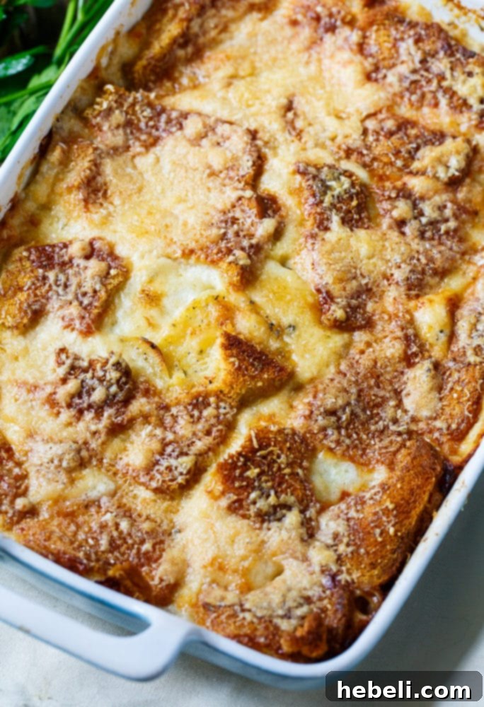 Close-up of Scalloped Potato Casserole with a golden crust and creamy interior.
