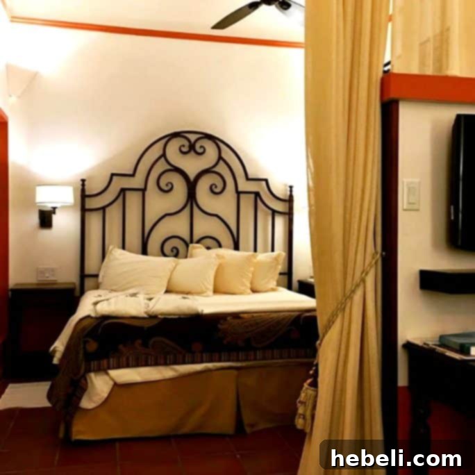 El Convento: A Timeless San Juan Escape 7 Elegant Bedroom with Robes and Chocolates at Hotel El Convento