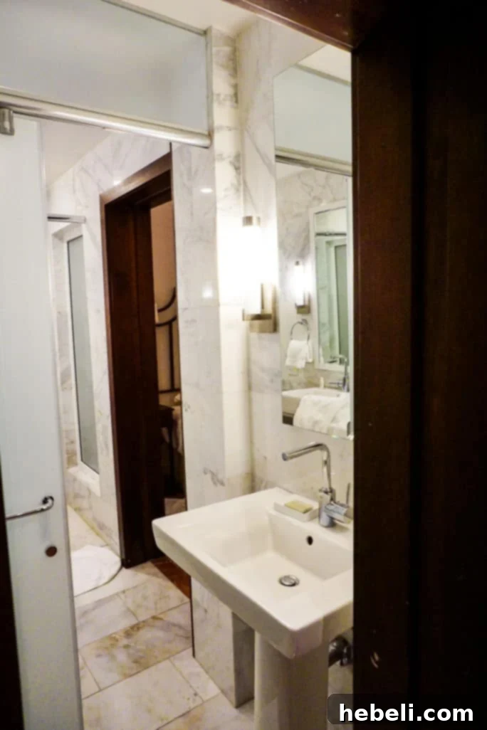 El Convento: A Timeless San Juan Escape 8 Luxurious Bathroom with Marble Finishes at Hotel El Convento