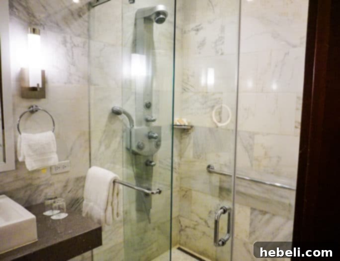 El Convento: A Timeless San Juan Escape 9 Close-up of Shower Area in Hotel El Convento Bathroom