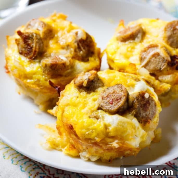 Delicious Sausage, Egg, and Cheese Hashbrown Muffins fresh out of the oven, a perfect grab-and-go breakfast