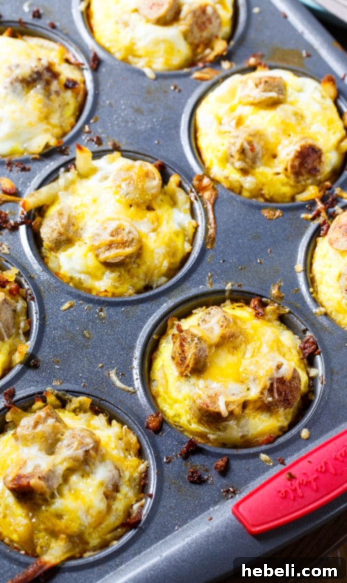 A tray of freshly baked Sausage, Egg, and Cheese Hashbrown Muffins, ready to be served