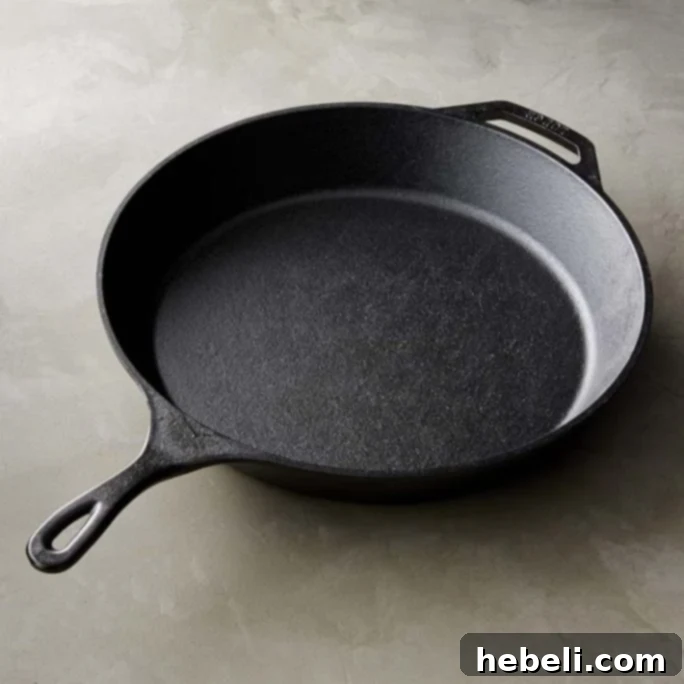 Lodge 13-inch Cast Iron Skillet, ideal for achieving extra crispy hash browns and versatile cooking