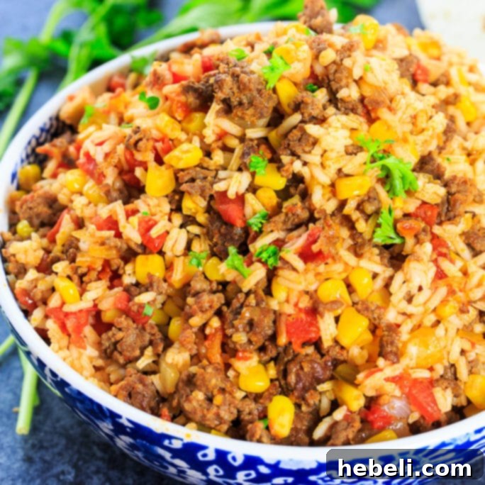 Chorizo Rice Fiesta 2 Mexican Chorizo Rice, a vibrant and spicy dish featuring crumbled chorizo, corn, and tomatoes.